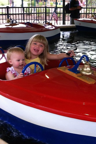 Lucy is very intent on steering. Catie is very intent on ringing the bell over and over.