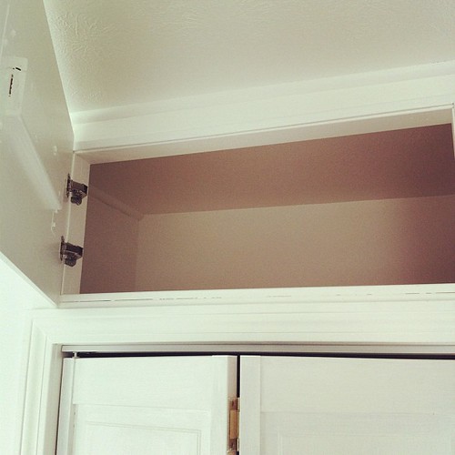 we designed storage cubbies above the closet for maximizing storage #diy #spaces #thisoldhouse #home #interiors