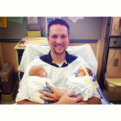 Daddy's first time holding them both together! Avery & Rhys, day 35. #twins #preemie