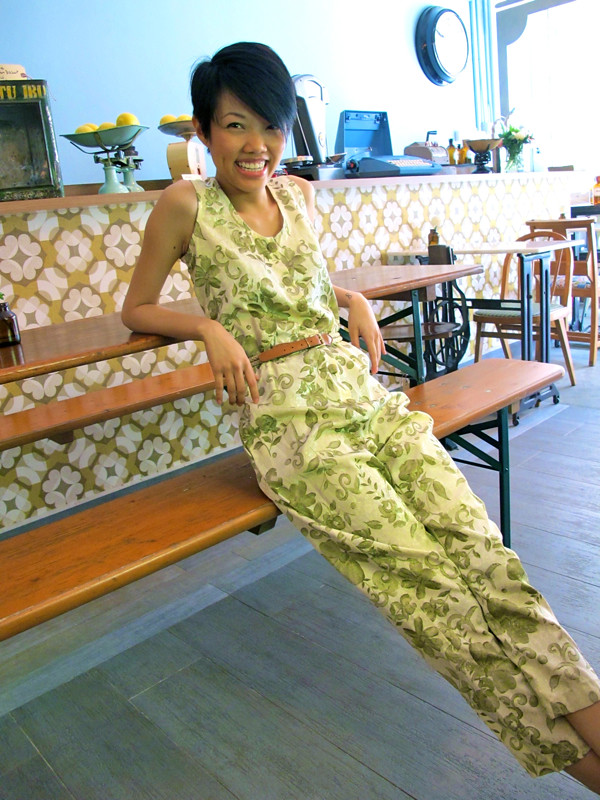 Make them green with envy with this friggin' awesome jumpsuit printed with petals and leaves! Worn here cinched with a skinny belt. 