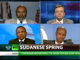 Abayomi Azikiwe, editor of the Pan-African News Wire, upper left, on RT satellite television's CrossTalk program on July 5, 2012. The program featured a debate on Sudan. by Pan-African News Wire File Photos