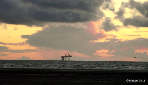 Oil / Gas Rig under Sunset by Mickaul