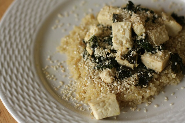steamed kale and tofu with quinoa and gomasio