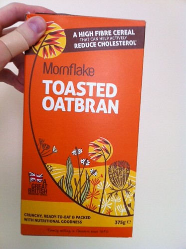 I like this packaging. It's like retro Sainsburys, but in 2012. (Ignore hurty thumb.) by benparkuk