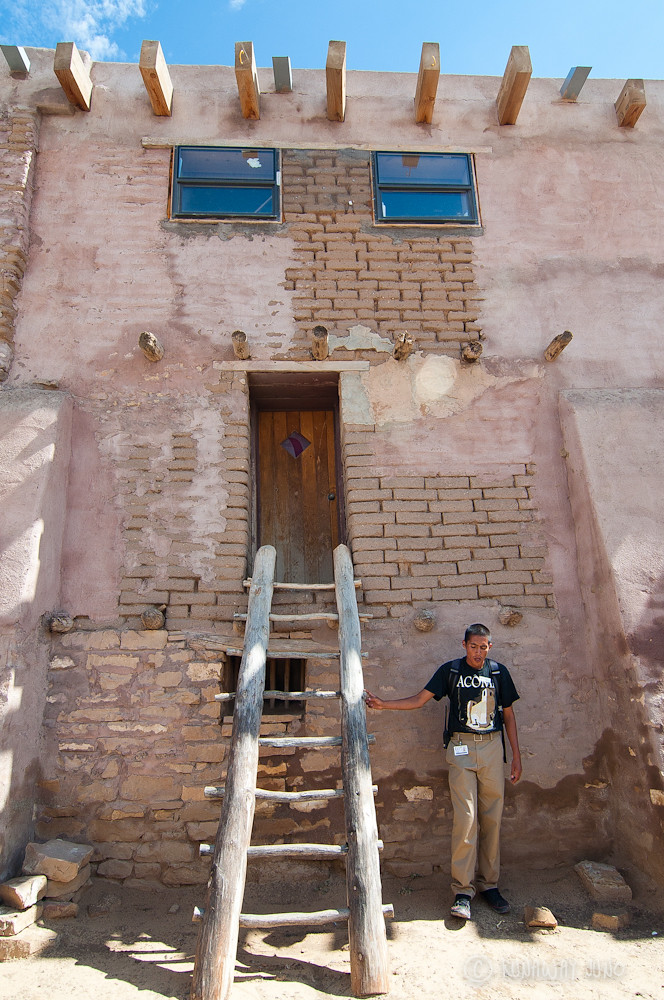 Acoma Pueblo building and our tour guide