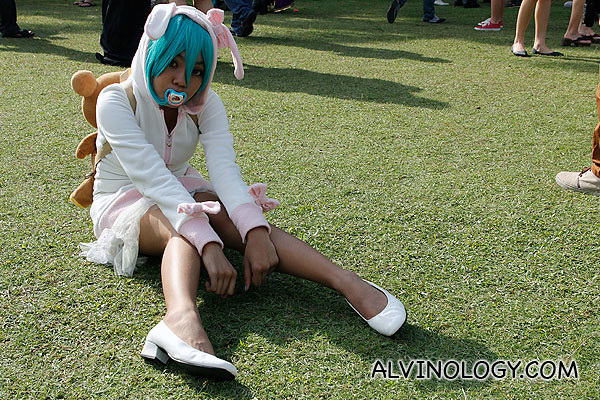 Cosplay baby with turquoise hair 