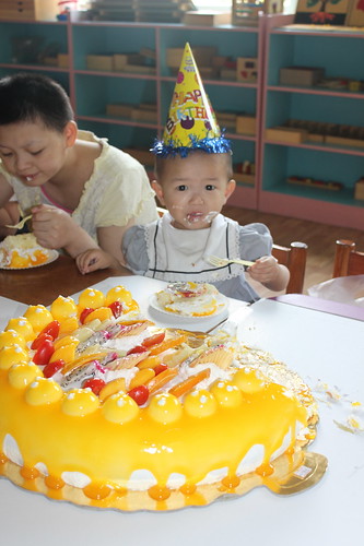 so beautiful... my littlest girl, in China, and the cake we had sent to her!