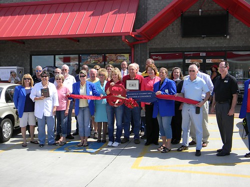 Acting Deputy Under Secretary Judith Canales (sixth from right) participates in a ribbon cutting ceremony for flex-fuel pumps in Waynesville, Missouri, funded in part through USDA’s Rural Energy for America Program.