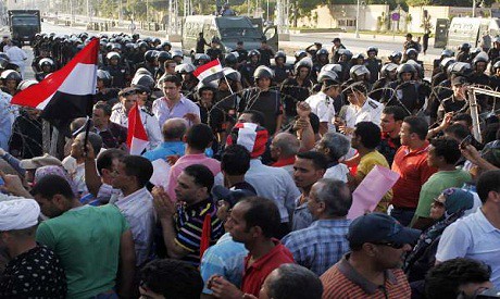 Egyptians demonstrate against the government of President Mohamed Morsi. The activists claim that the Muslim Brotherhood is attempting to dominate the country politically. by Pan-African News Wire File Photos