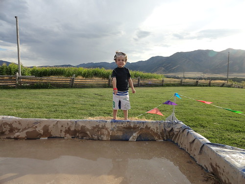Olsen isn't sure about going in the mud pool
