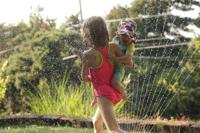 End of the day sprinkler fun (K to the rescue)