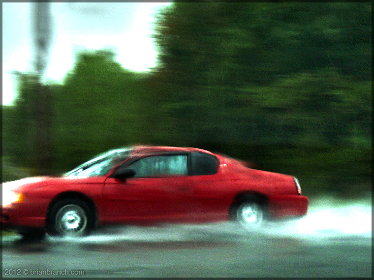 P1280167_red_car_in_rain