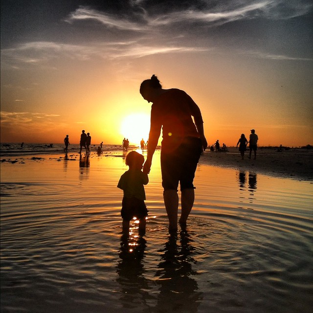 Me and George, silhouettes on the beach.