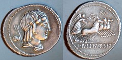 RRC 352/1c L.IVLI BVRSIO Julia Denarius. Neptune, Victory quadriga. Rome 85BC. Obverse control mark two Janus head bronze asses. Remarkable.