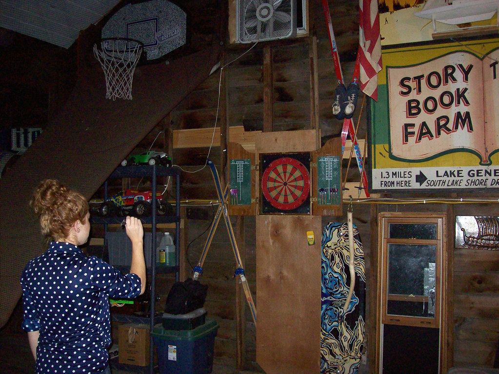 playing darts in my parents' barn