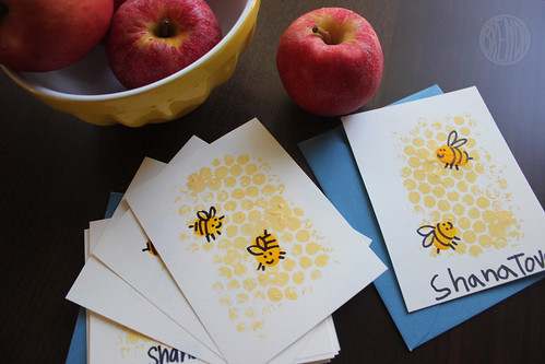 overhead picture of handmade Shana Tova cards with bess and honeycomb 