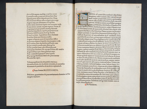 Colophon and illuminated initial in Priscianus: Opera