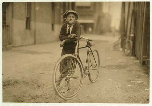 Messenger boy working for Mackay Telegraph Company. Said fifteen years old. Exposed to Red Light dangers. &nbsp;(LOC)