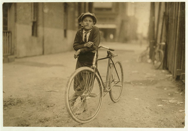 Messenger boy working for Mackay Telegraph Company. Said fifteen years old. Exposed to Red Light dangers.  (LOC)