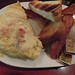 Lobster & crab meat omelette with toast, bacon & potatoes posted by kevincrumbs to Flickr