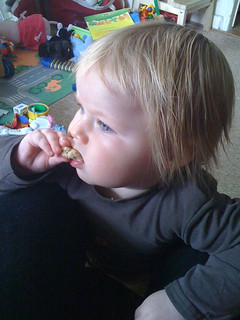 baby eating with fingers
