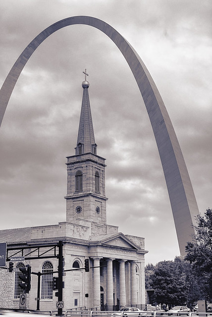 Basilica of Saint Louis, King of France, with Gateway Arch, in Saint Louis, Missouri, USA