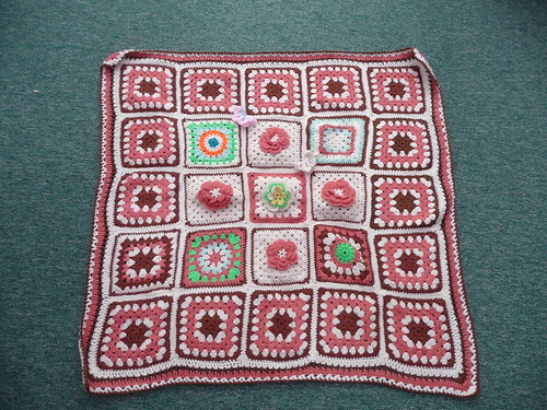 A beautiful Blanket, gorgeous Flower Squares.