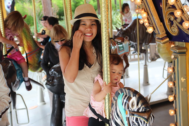 Going on the carousel with Mama