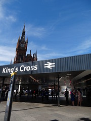 King's Cross Station sign With St. Pancras Station in the background