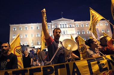 Demonstrations in Greece opposing the imposition of austerity. German Chanceller Angela Merkel visited the country on October 9, 2012. by Pan-African News Wire File Photos