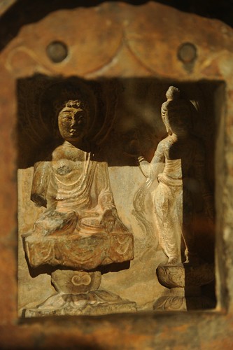 Lord Buddha and Quan Yin in stone shrine enclosure on pedestals, Art Institute of Chicago, Illinois, USA by Wonderlane