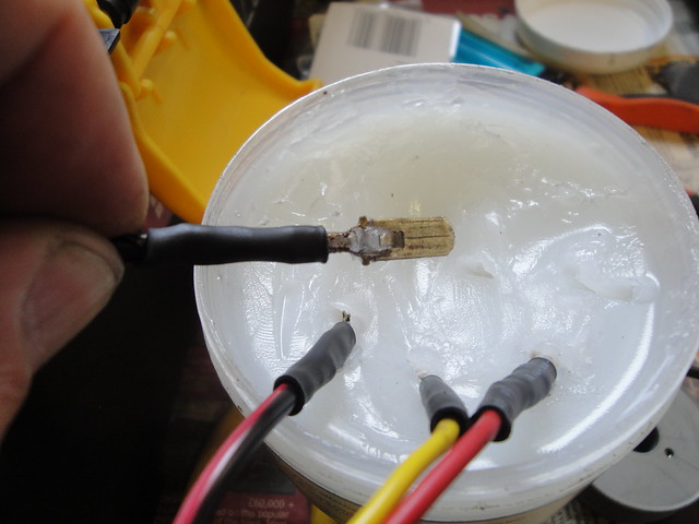 Coating electrical connectors in petroleum jelly