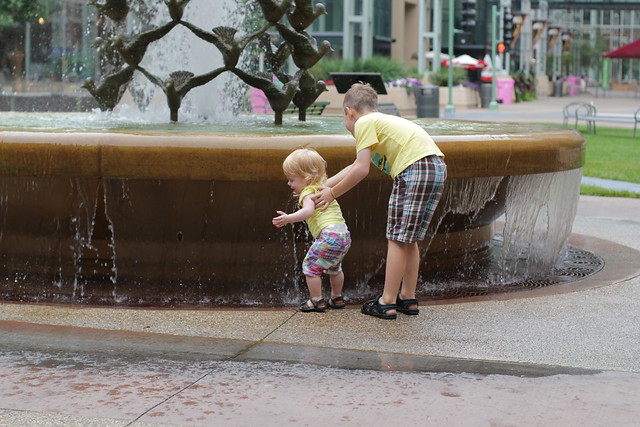 Benjamin and Lucy enjoying Peace Fountain in downtown Rochester