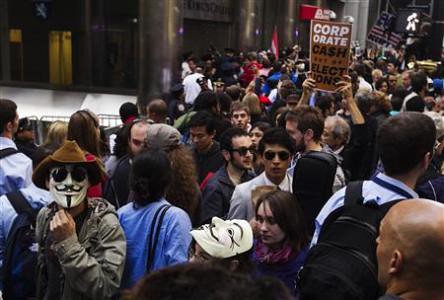 Occupy Wall Street demonstrators in the financial district of New York City. The demonstration attempted to block people from entering the banking district of Lower Manhattan. by Pan-African News Wire File Photos