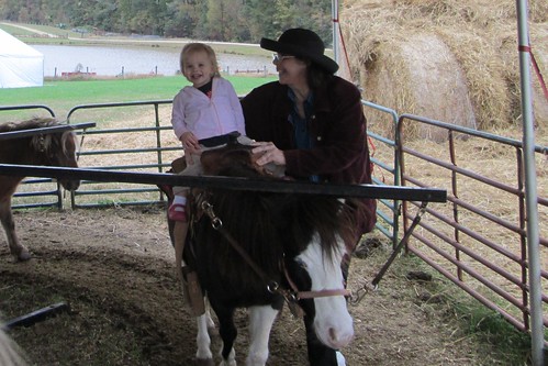 Lucy's first pony ride (with assistance from Mimi)