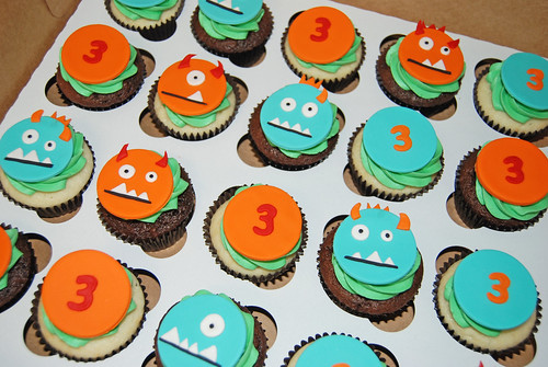 orange red and aqua blue 3rd birthday monster cupcakes