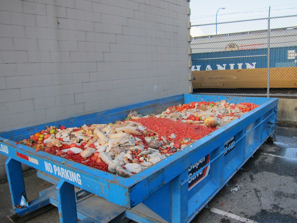 A dumpster full of discarded food. Photo by Stephen Rees