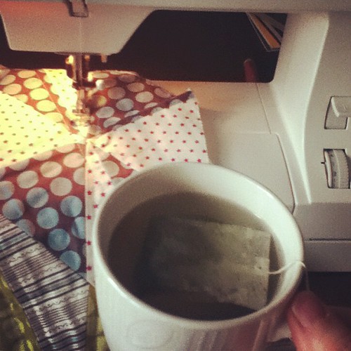 Drinking tea and quilting since I'm #notgoingtosewingsummit.