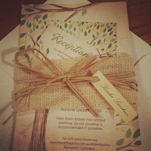 Bride Nadine sent in a shot of her packaged up invitation suite - love how she personalized it! www.allicoateweddings.etsy.com