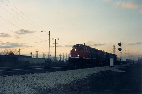 Southbound Grand Trunk Western freight train passing through Hayford Junction at twilight.  Chicago Illinois.  May 1989. by Eddie from Chicago