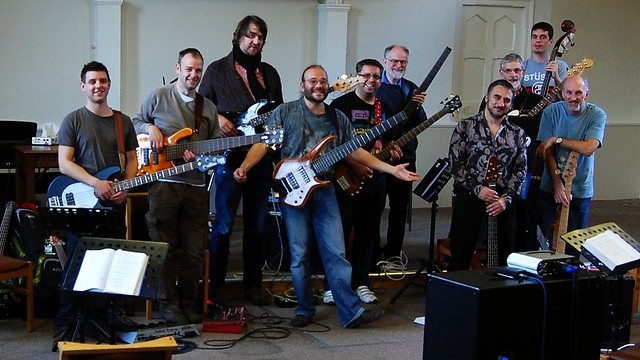 Group shot of ten bassists