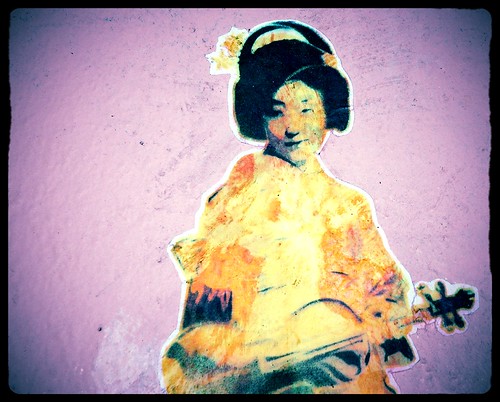 Violin gesha, sticker, wall near MOMA, San Francisco, California, USA by Wonderlane
