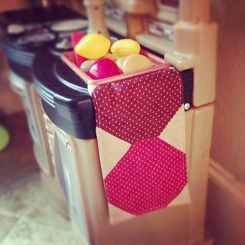 A dish towel for Button's kitchen from Santa! he is thrilled. Four leftover snowball blocks.