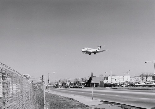 Midway Airlines jet landing at Chicago's Midway Airport. (Defunct)  Chicago Illinois.  April 1990. by Eddie from Chicago