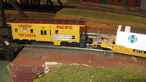 H.O Scale  Union Pacific bay window caboose trails an intermodal train. by Eddie from Chicago