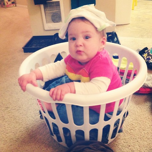 Such a good laundry folder. She attributes her skills to the washcloth-as-a-hat.