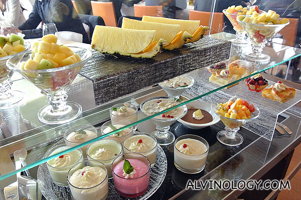 Wide selection of food items and fruits for dessert 