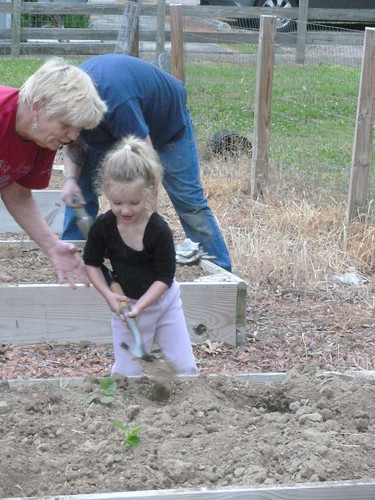 Congregation members of all ages help tend to the church garden at First Baptist Church in Sanford, North Carolina.