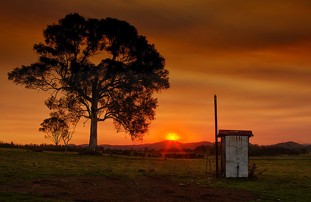 Sunset over the outhouse email