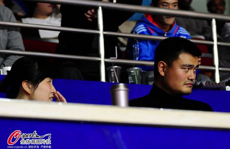 December 2nd, 2012 - Yao Ming and wife Ye Li watch the Shanghai Sharks play Tracy McGrady's Qingdao team